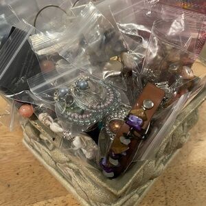 Beautiful sage green dish with fun jewelry